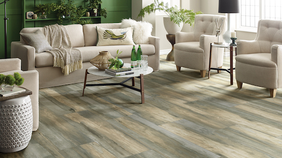 wood look tile flooring in an earth toned living room